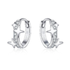 Boucles d’Oreilles Créoles Étoiles <titolo_esteso><span>en argent 925 plaqué or blanc avec zircons blancs</span></titolo_esteso>