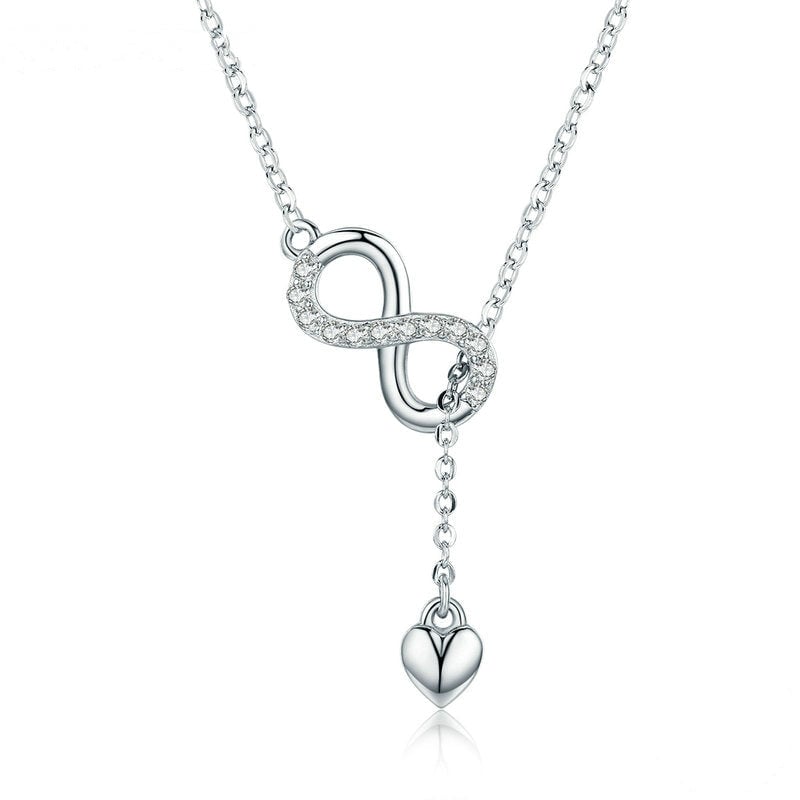 Collier Infini avec Coeur <titolo_esteso><span>en argent 925 plaqué or blanc ajustable avec zircons blancs</span></titolo_esteso>