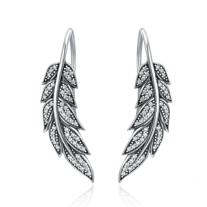 Boucles d'Oreilles Plumes <titolo_esteso><span>en argent 925 plaqué or blanc avec zircons blancs</span></titolo_esteso>