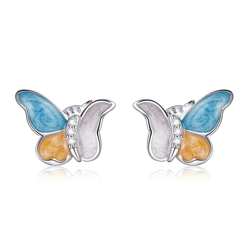 Boucles d'Oreilles Papillons <titolo_esteso><span>en argent 925 plaqué or blanc émaillé à la main avec zircons blancs</span></titolo_esteso>