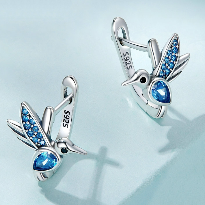 Boucles d'Oreilles Petits Oiseaux <titolo_esteso><span>en argent 925 plaqué or blanc avec zircons bleus</span></titolo_esteso> - Image 3