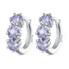 Boucles d'Oreilles Créoles Étoiles <titolo_esteso><span>en argent 925 plaqué or blanc avec zircons violet</span></titolo_esteso>