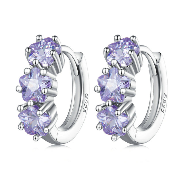 Boucles d'Oreilles Créoles Étoiles <titolo_esteso><span>en argent 925 plaqué or blanc avec zircons violet</span></titolo_esteso>