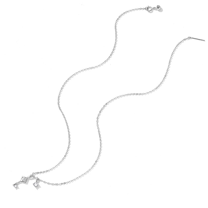 Collier Clé <titolo_esteso><span>en argent 925 plaqué or blanc ajustable avec zircons blancs</span></titolo_esteso> - Image 4