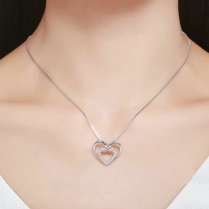 Collier Double Coeur avec Infini <titolo_esteso><span>en argent 925 plaqué or blanc et or rose ajustable avec zircons blancs</span></titolo_esteso> - Image 2