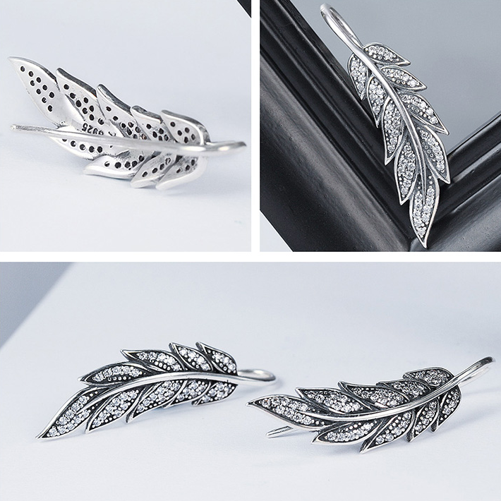 Boucles d'Oreilles Plumes <titolo_esteso><span>en argent 925 plaqué or blanc avec zircons blancs</span></titolo_esteso> - Image 4