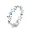Bague Étoile de Mer <titolo_esteso><span>en argent 925 plaqué or blanc avec zircons bleus</span></titolo_esteso>