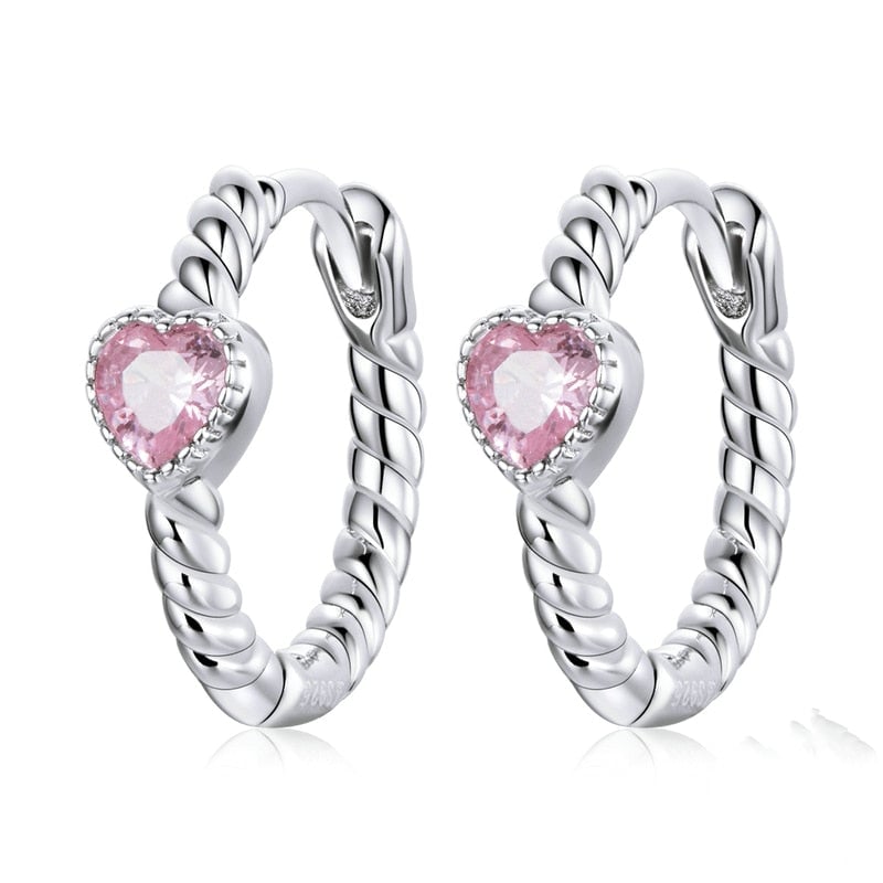 Boucles d’Oreilles Créoles Coeurs <titolo_esteso><span>en argent 925 plaqué or blanc avec zircons roses</span></titolo_esteso>