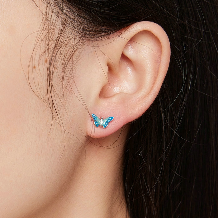 Boucles d'Oreilles Papillons <titolo_esteso><span>en argent 925 plaqué or blanc émaillées bleues avec zircons bleues</span></titolo_esteso> - Image 2