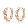 Boucles d’Oreilles Créoles Coeurs <titolo_esteso><span>en argent 925 plaqué or rose avec zircons blancs</span></titolo_esteso>