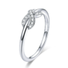 Bague Infini Brillant <titolo_esteso><span>en argent 925 plaqué or blanc avec pavé de zircons blancs</span></titolo_esteso>