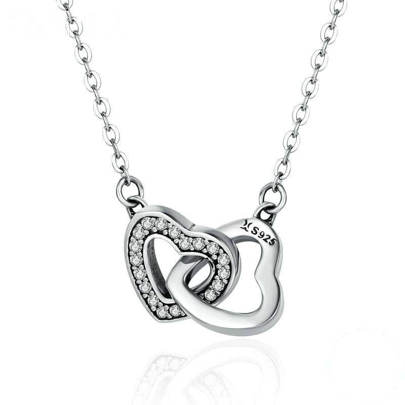 Collier Deux Coeurs <titolo_esteso><span>en argent 925 plaqué or blanc ajustable avec zircons blancs</span></titolo_esteso>