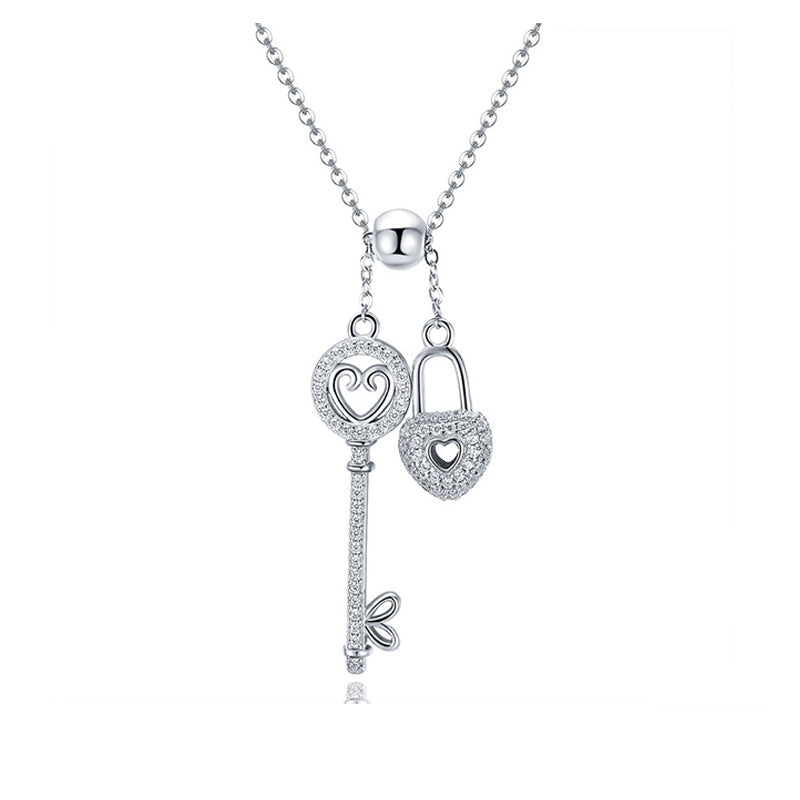 Collier Clé et Cadenas Coeur <titolo_esteso><span>en argent 925 plaqué or blanc ajustable avec zircon blanc</span></titolo_esteso>