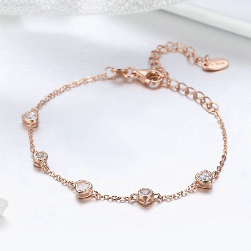 Bracelet Coeurs Lumineux <titolo_esteso><span>en argent 925 plaqué or rose ajustable avec zircons blancs</span></titolo_esteso> - Image 3