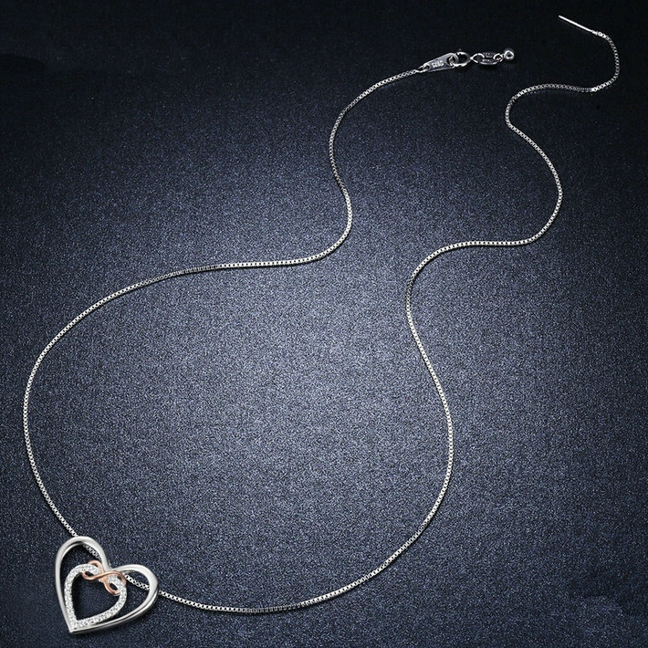 Collier Double Coeur avec Infini <titolo_esteso><span>en argent 925 plaqué or blanc et or rose ajustable avec zircons blancs</span></titolo_esteso> - Image 4