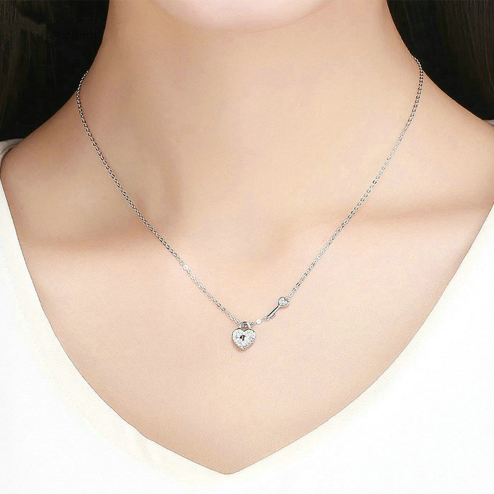 Collier Clé et Cadenas Coeur <titolo_esteso><span>en argent 925 plaqué or blanc ajustable avec zircon blanc</span></titolo_esteso> - Image 2