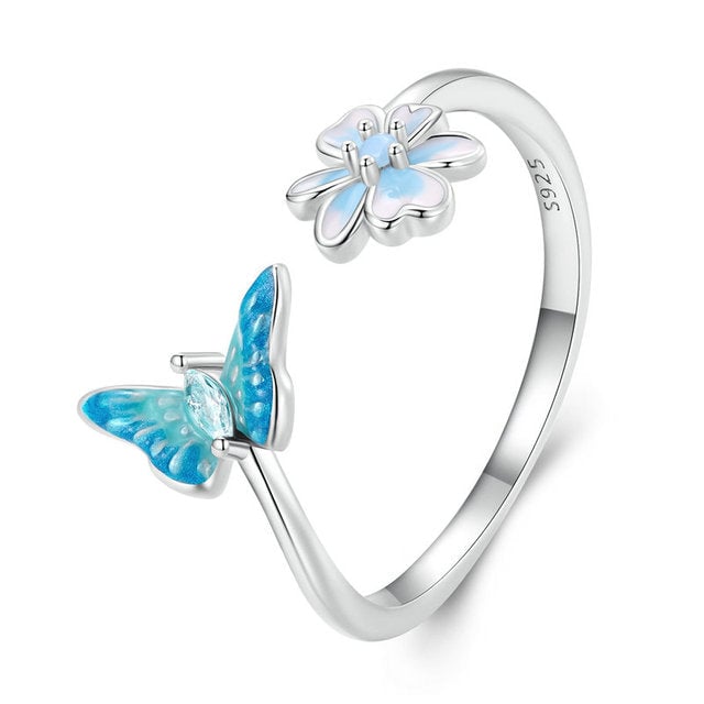 Bague Papillon avec Fleur <titolo_esteso><span>en argent 925 plaqué or blanc ajustable émaillée à la main avec zircon bleu et opale</span></titolo_esteso>