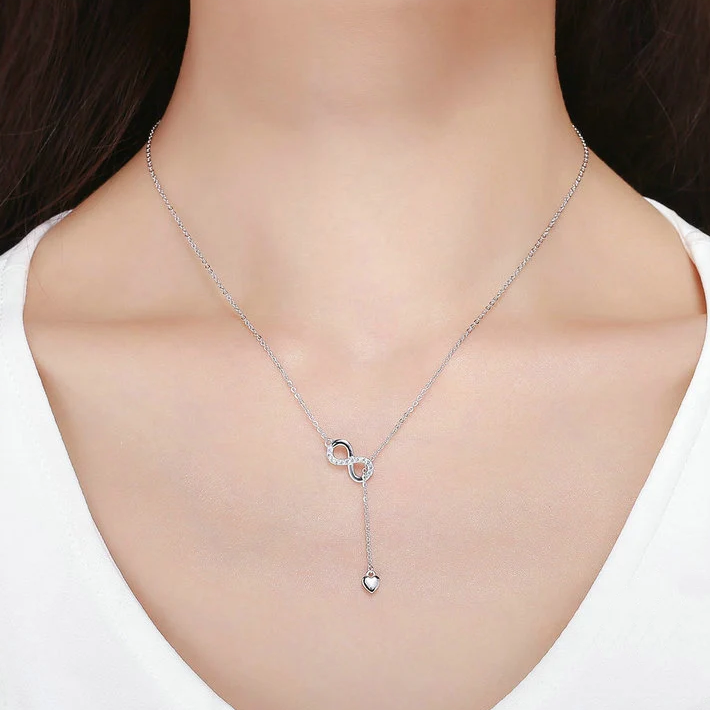 Collier Infini avec Coeur <titolo_esteso><span>en argent 925 plaqué or blanc ajustable avec zircons blancs</span></titolo_esteso> - Image 2