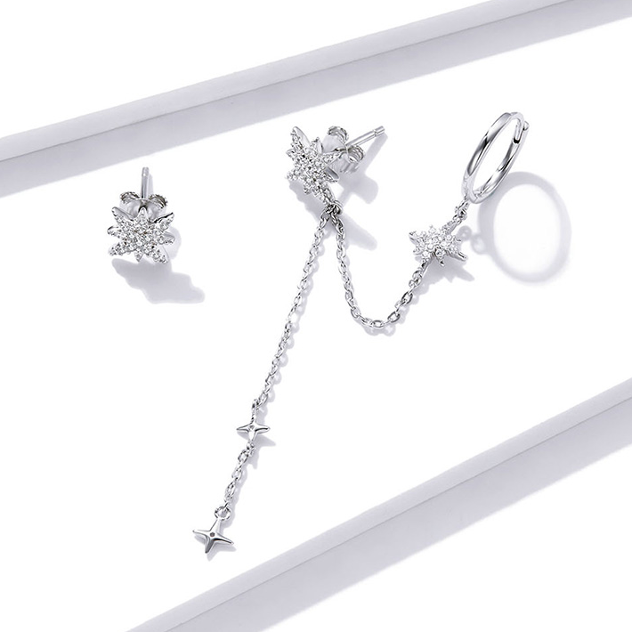 Boucles d'Oreilles Étoiles <titolo_esteso><span>en argent 925 plaqué or blanc asymétrique avec zircons blancs</span></titolo_esteso> - Image 4
