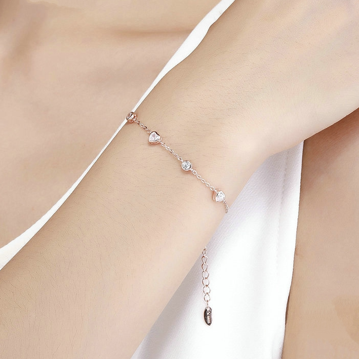 Bracelet Coeurs Lumineux <titolo_esteso><span>en argent 925 plaqué or rose ajustable avec zircons blancs</span></titolo_esteso> - Image 2
