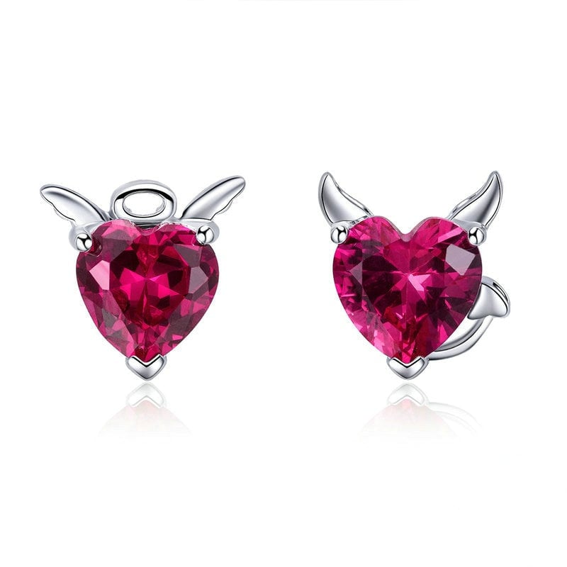 Boucles d'Oreilles Coeurs <titolo_esteso><span>en argent 925 plaqué or blanc avec zircons rouges</span></titolo_esteso>