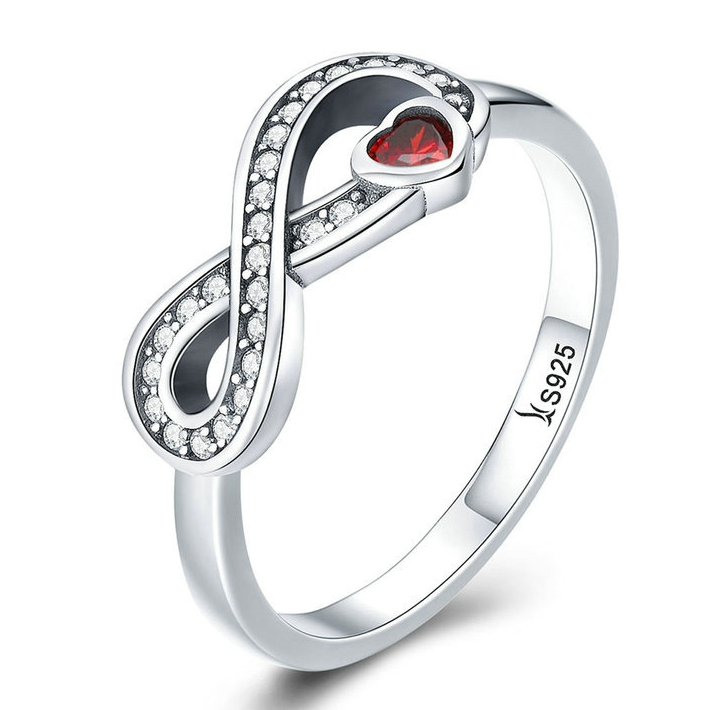 Bague Infini avec Coeur <titolo_esteso><span>en argent 925 plaqué or blanc avec zircons blancs et rouge</span></titolo_esteso>