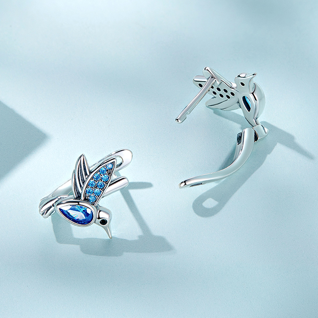 Boucles d'Oreilles Petits Oiseaux <titolo_esteso><span>en argent 925 plaqué or blanc avec zircons bleus</span></titolo_esteso> - Image 5