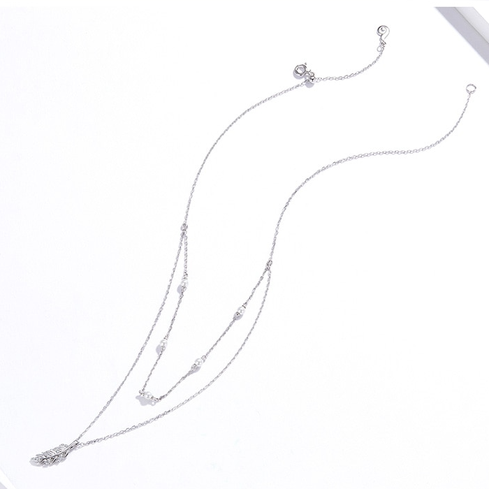 Collier Double avec Plume <titolo_esteso><span>en argent 925 plaqué or blanc ajustable avec zircons blancs et perles</span></titolo_esteso> - Image 5
