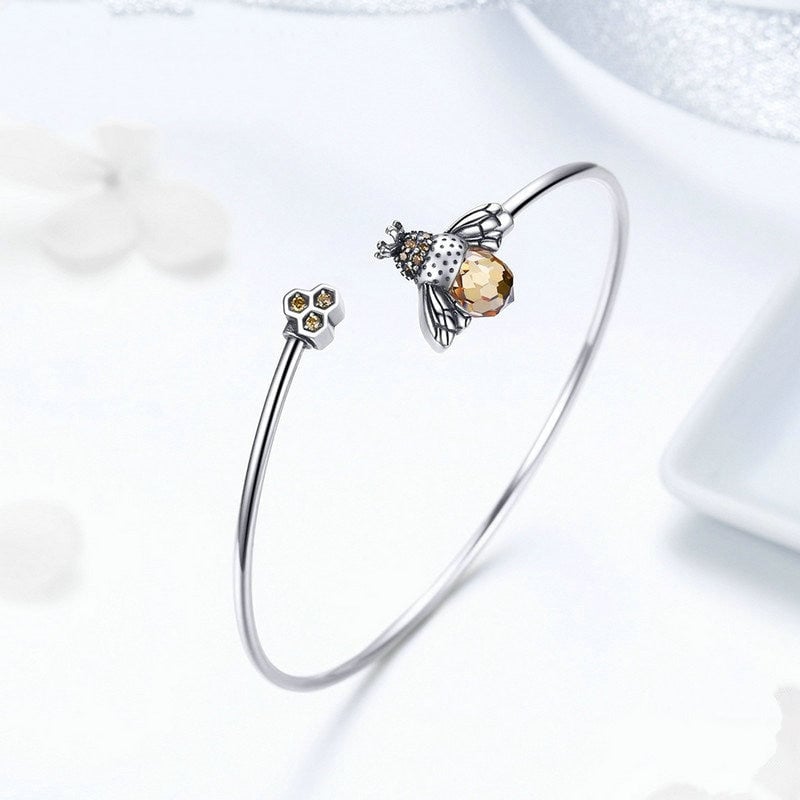Bracelet Reine des Abeilles <titolo_esteso><span>en argent 925 plaqué or blanc jonc rigide ouvert avec zircons bruns</span></titolo_esteso> - Image 4