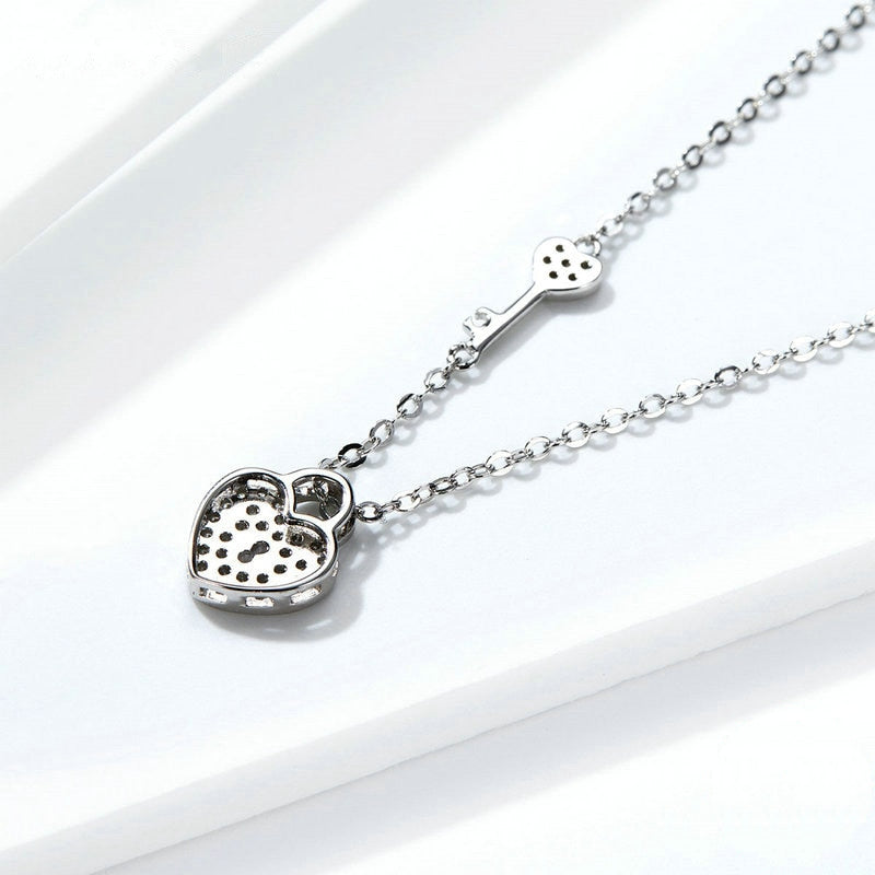 Collier Clé et Cadenas Coeur <titolo_esteso><span>en argent 925 plaqué or blanc ajustable avec zircon blanc</span></titolo_esteso> - Image 4