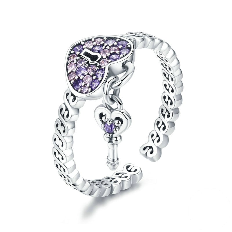 Bague Cadenas Coeur <titolo_esteso><span>en argent 925 plaqué or blanc ajustable avec zircons violets</span></titolo_esteso>