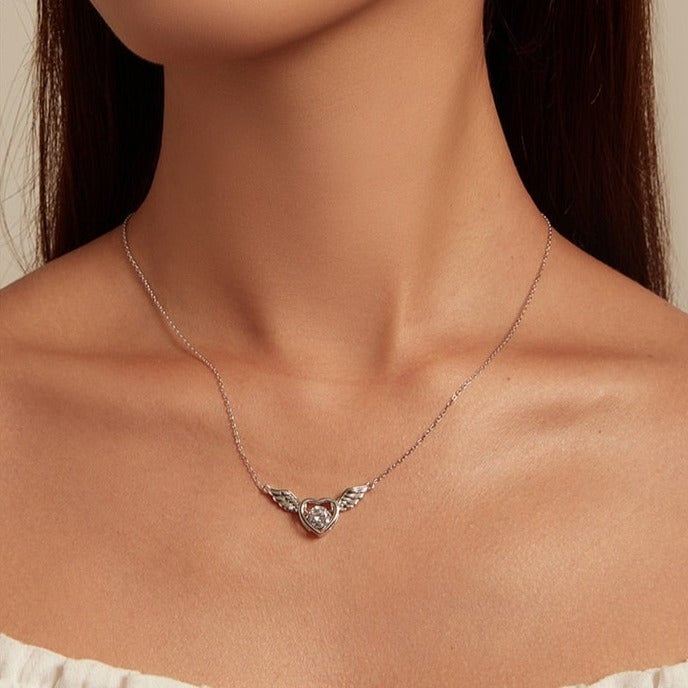 Collier Coeur Ailé <titolo_esteso><span>en argent 925 plaqué or blanc ajustable avec zircon blanc</span></titolo_esteso> - Image 2