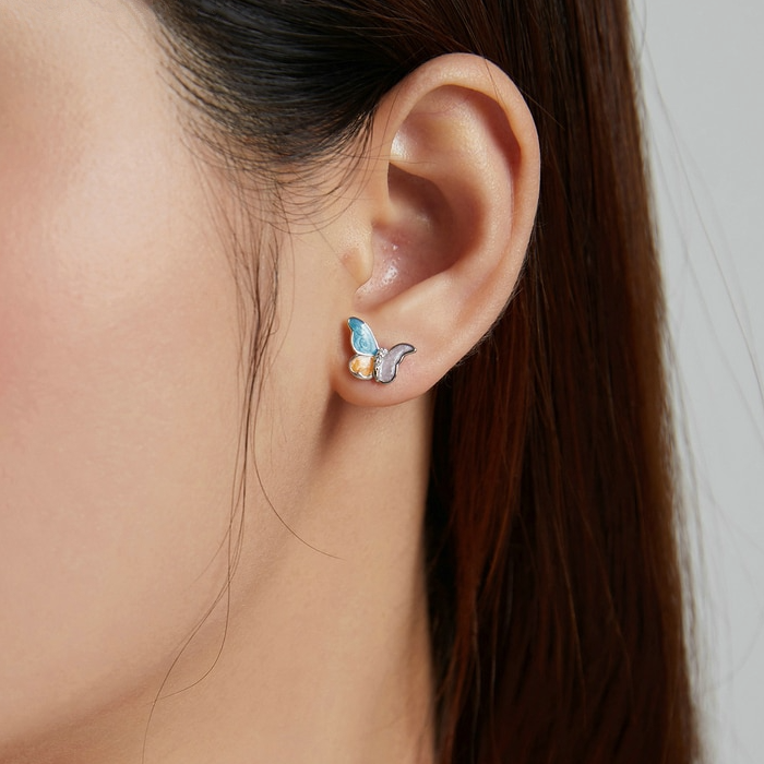 Boucles d'Oreilles Papillons <titolo_esteso><span>en argent 925 plaqué or blanc émaillé à la main avec zircons blancs</span></titolo_esteso> - Image 2