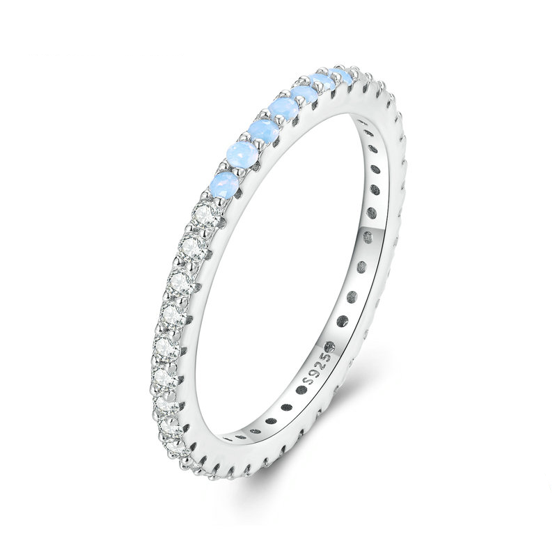 Bague Éternité <titolo_esteso><span>en argent 925 plaqué or blanc avec zircons blancs et bleus</span></titolo_esteso>