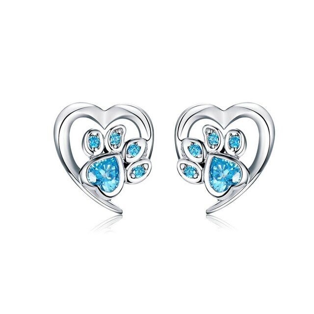 Boucles d'Oreilles Coeur avec Patte <titolo_esteso><span>en argent 925 plaqué or blanc avec zircons bleus</span></titolo_esteso>
